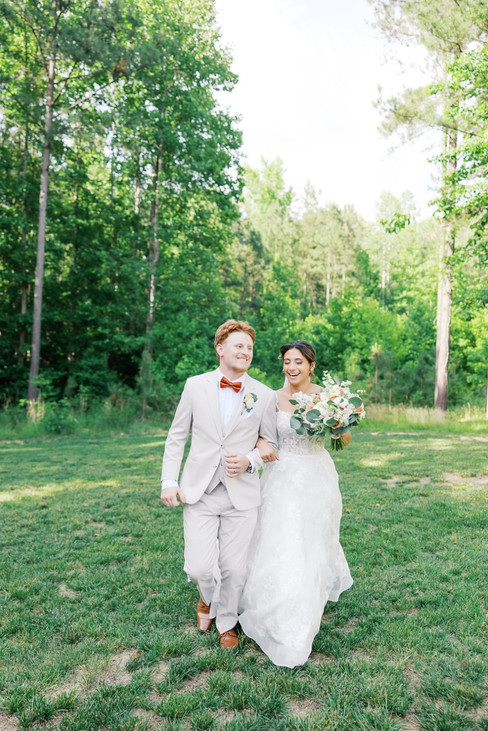 5. Bride and groom walking together during portraits near Richmond Virginia