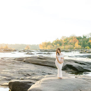 mom during maternity session at belle isle in richmond va
