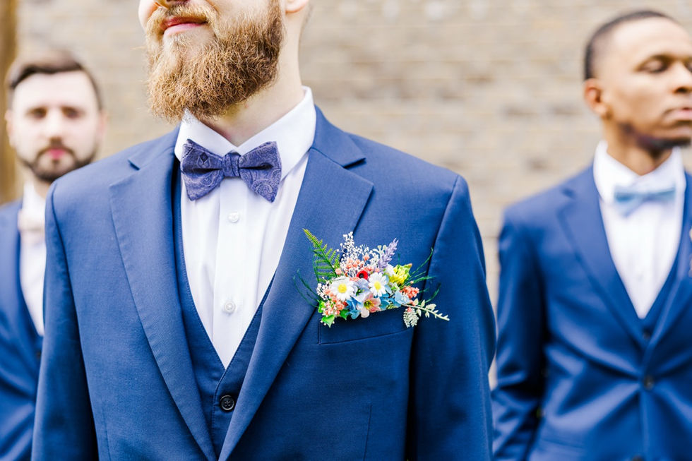 groom's tie and boutonniere at wedding day