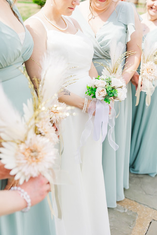 	18.	Bride and bridesmaids walking through garden with bouquets