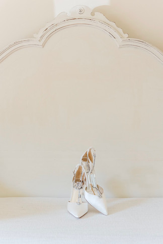 Detail shots of shoes, jewelry, and rings at Nyiela and Don’s wedding, taken by a Richmond Virginia wedding photographer.