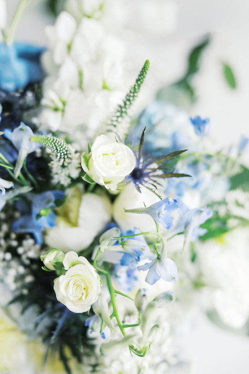 16. Spring wedding bouquet with blue and white flowers in Lunenburg VA