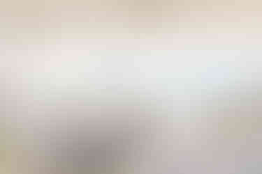 1. “Elegant wedding reception setup with white chairs and string lights at The Virginia Cliffe Inn”