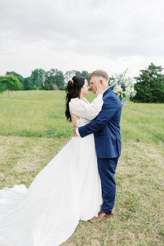 19. Romantic bride and groom portrait in open field for Virginia countryside wedding
