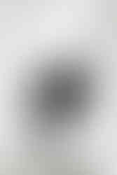 10. Groom standing confidently in tuxedo near mirror — elegant fine-art groom portrait in Richmond, VA.