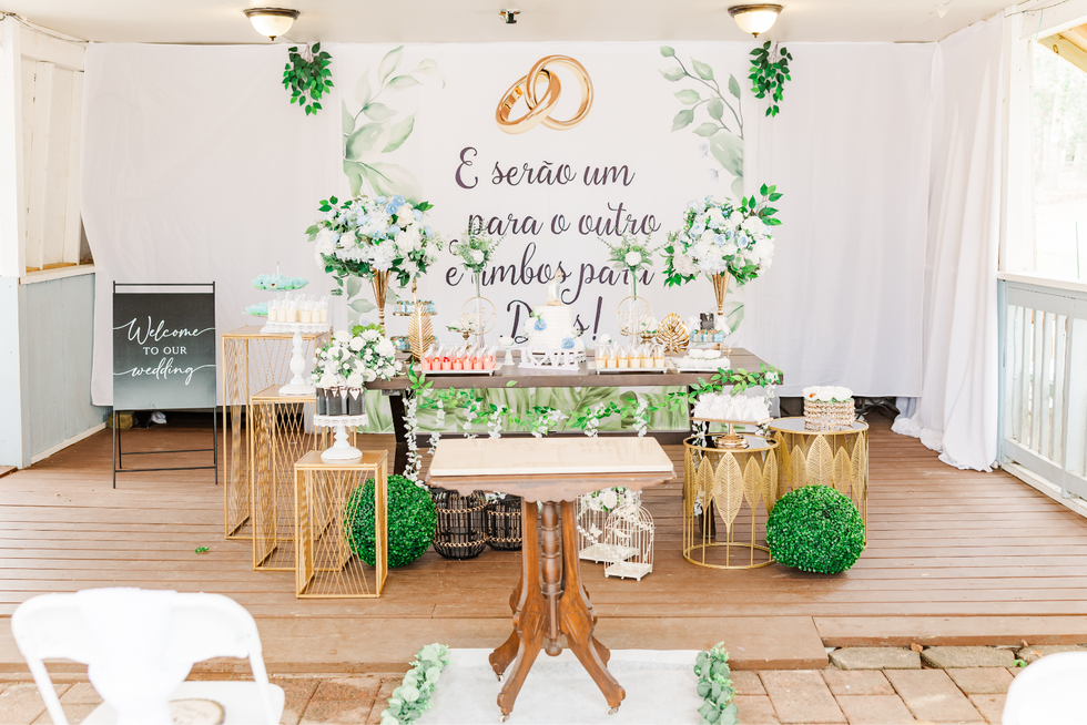 13. Elegant wedding reception setup with greenery and romantic floral decor