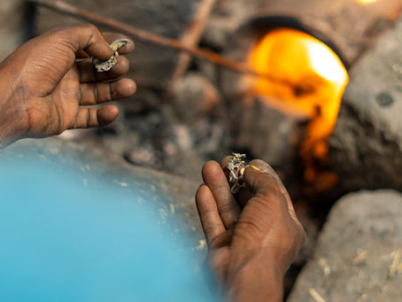 Brass artisan working with ancient techniques and fire