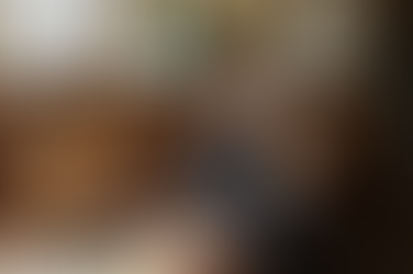 Woman laying on a couch