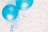 Studio shot of balloons on colored spott