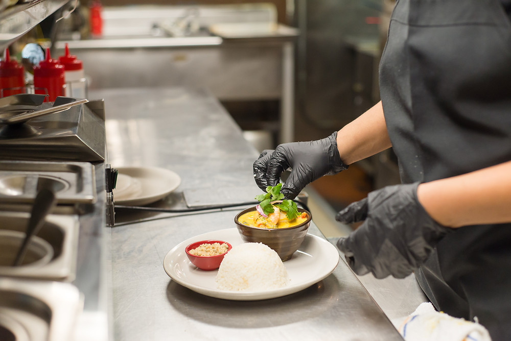 A staff member at Casa Brasil restaurant in Pittsburgh