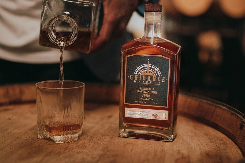 Guidance Whiskey, a Black-owned small-batch whiskey is poured into a glass