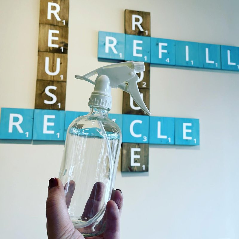 a refillable spray bottle at Little Spark Refill Shop