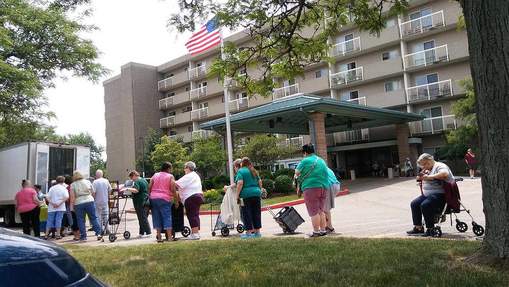 Customers lining up for one of StarkFresh's mobile farmer's markets outside of a nursing home in Canton, Ohio