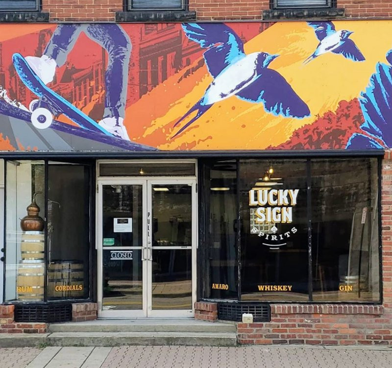 Storefront of Lucky Sign Spirits in Millvale, Pennsylvania