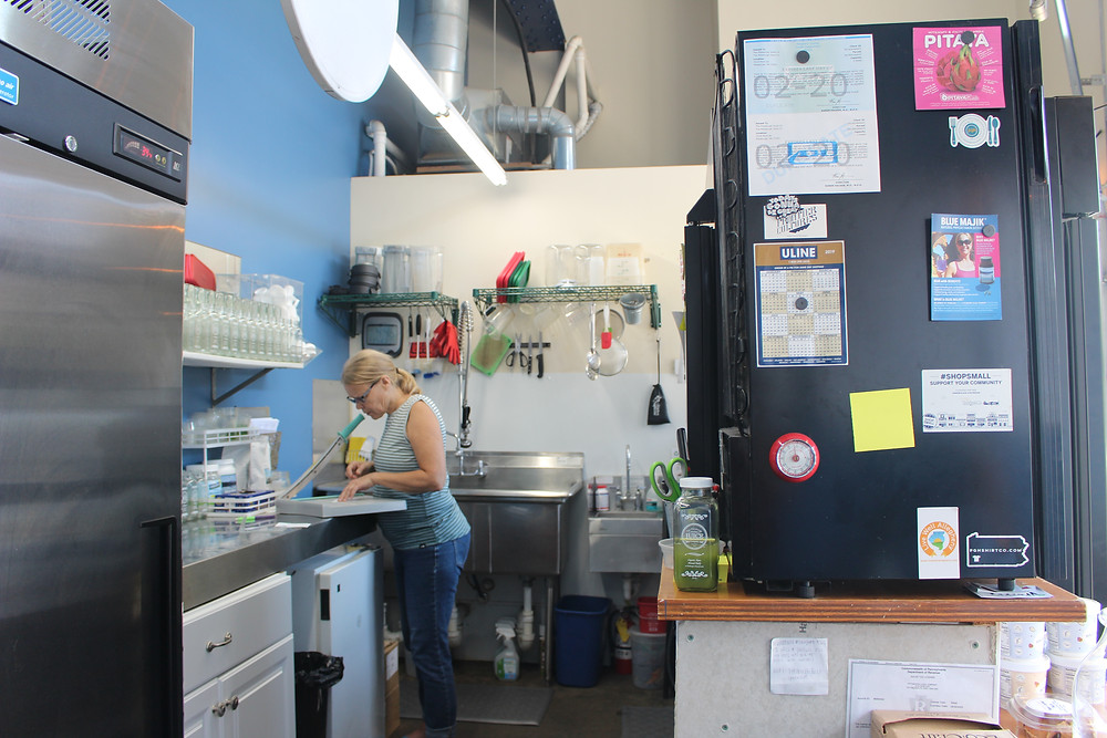 Naomi Homison in the kitchen at The Pittsburgh Juice Company