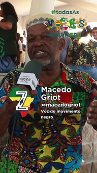 Macedo Griot, @macedogriot, Voz do movimento negro, #todasasvozes, falando num evento.