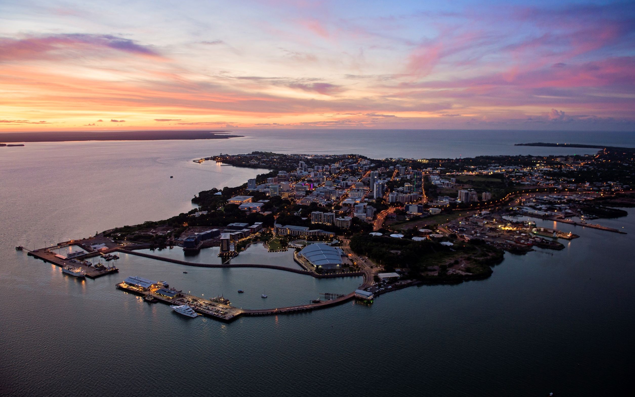 Aerial view of Darwin city, harbour and coastline at sunset