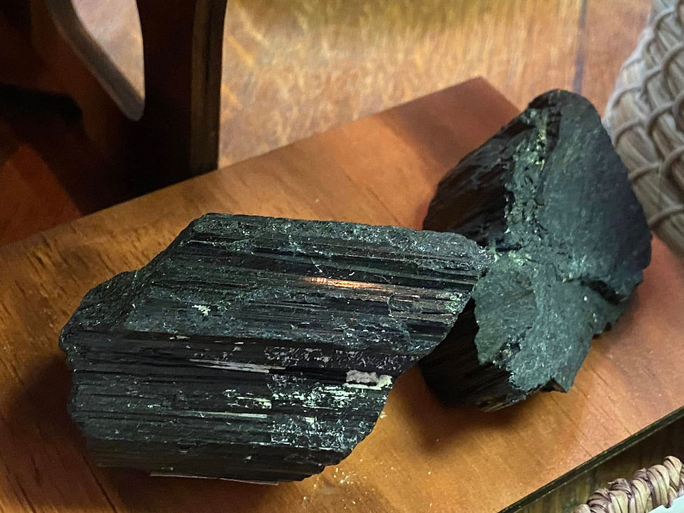 Two pieces of raw black tourmaline