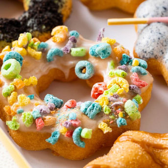 Colorful cereal-sprinkled Mochinut donut