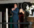 A guy standing on a 360 platform blows out smoking gun hand signals