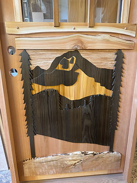 exterior picture door depicting a mountain scene