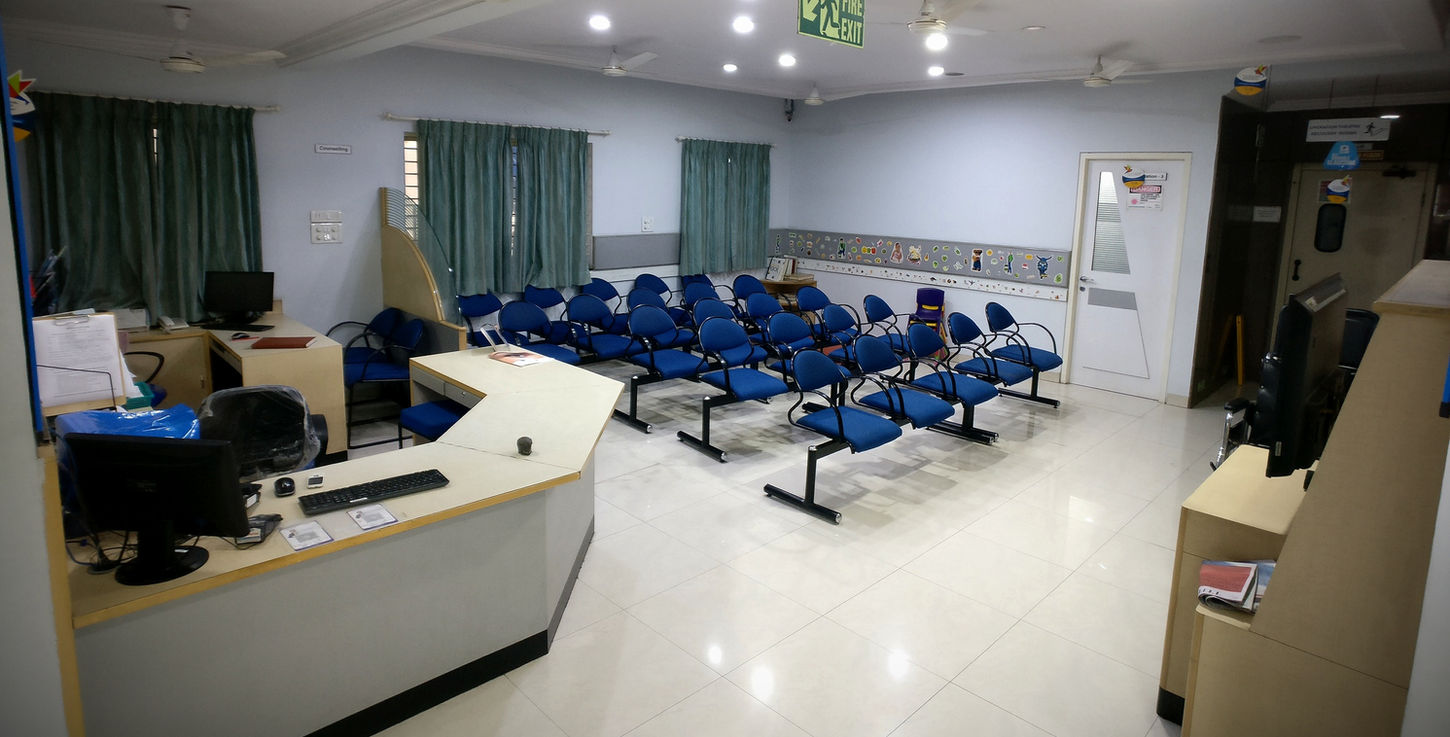 Spacious waiting room and children's play area at Tirumalai Eye Clinic
