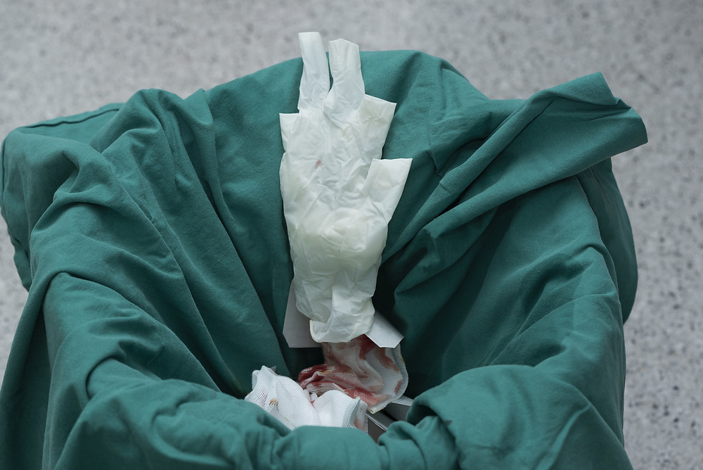 Removing contaminated PPE - COSHH guidelines