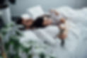 beautiful-young-couple-in-pajamas-embracing-while-2023-11-27-05-36-28-utc.jpg