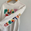 Thumbnail: witte longsleeve opdruk H&M 122/128