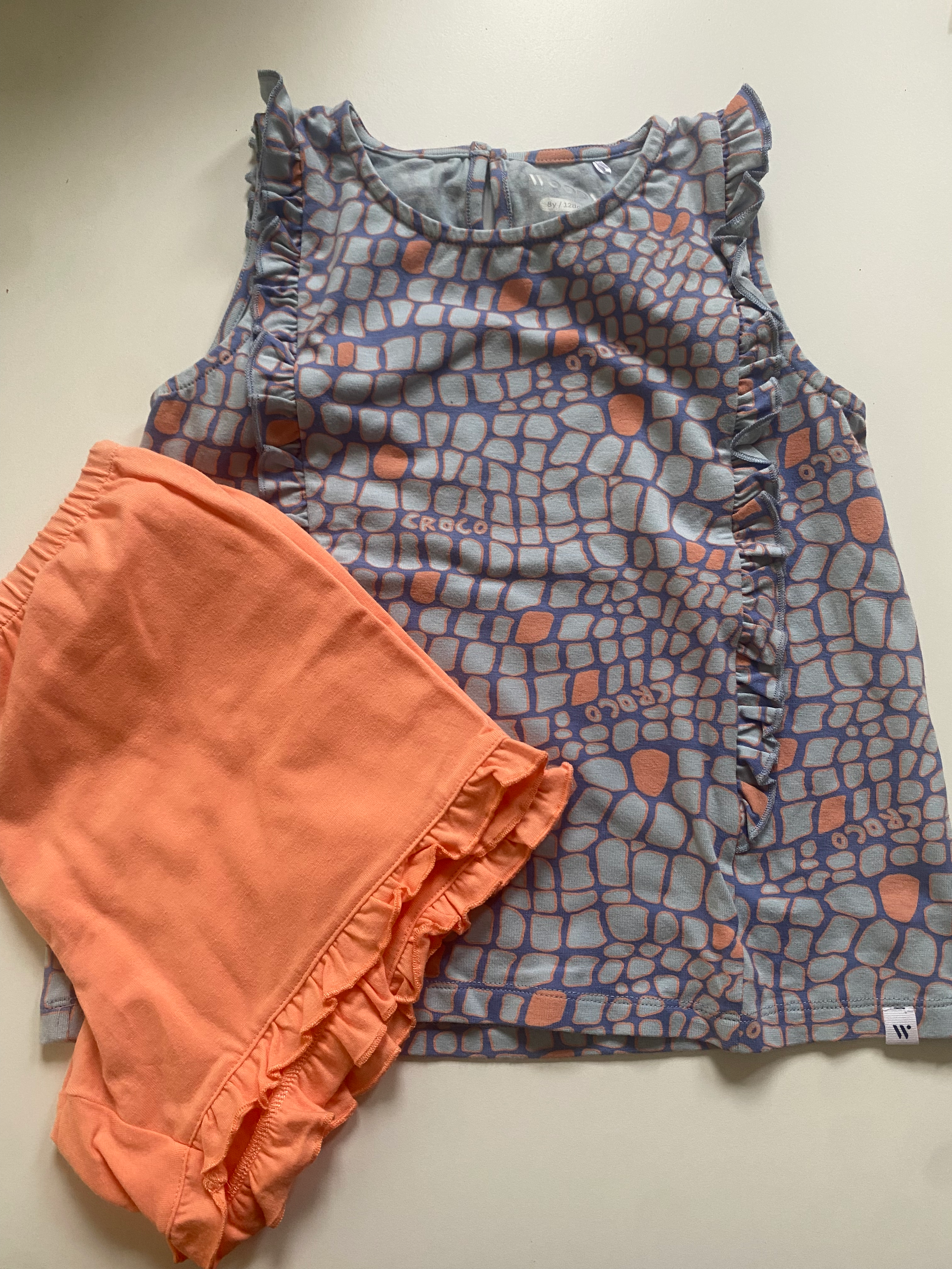 blauwe top print met oranje short woody 128