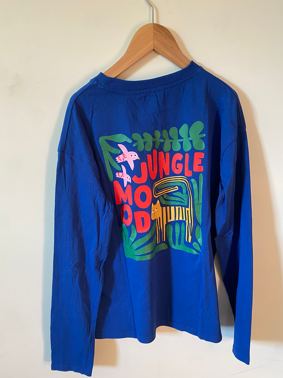 Thumbnail: blauwe longsleeve opdruk achteraan kiabi 152
