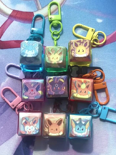 ᴇᴇᴠᴇᴇ ᴇᴠᴏʟᴜᴛɪᴏɴꜱ Light Up Clicky Keycap Keychains