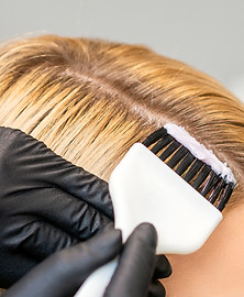 hairdresser-colors-female-customer-hair.