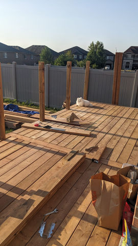 Beautiful large new deck made from pressure treated lumber summer bbq bakyard pine trees modern backyard vinyl fence decowalls.ca