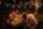 Cropped shot of four handsome friends having dinner in the backyard.jpg