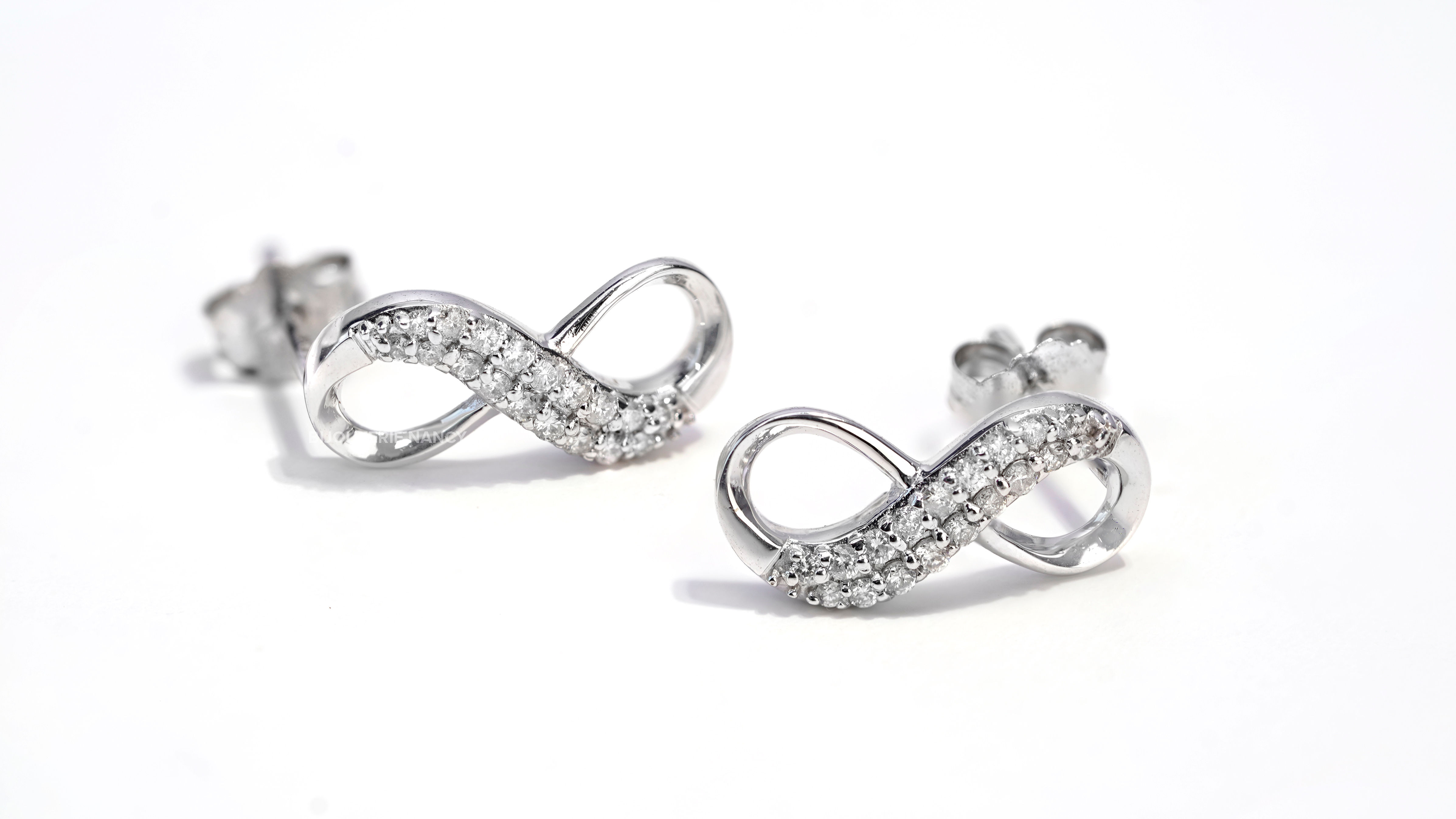 Infinity earring 10k 0.18 Carat Diamond Infinity earring