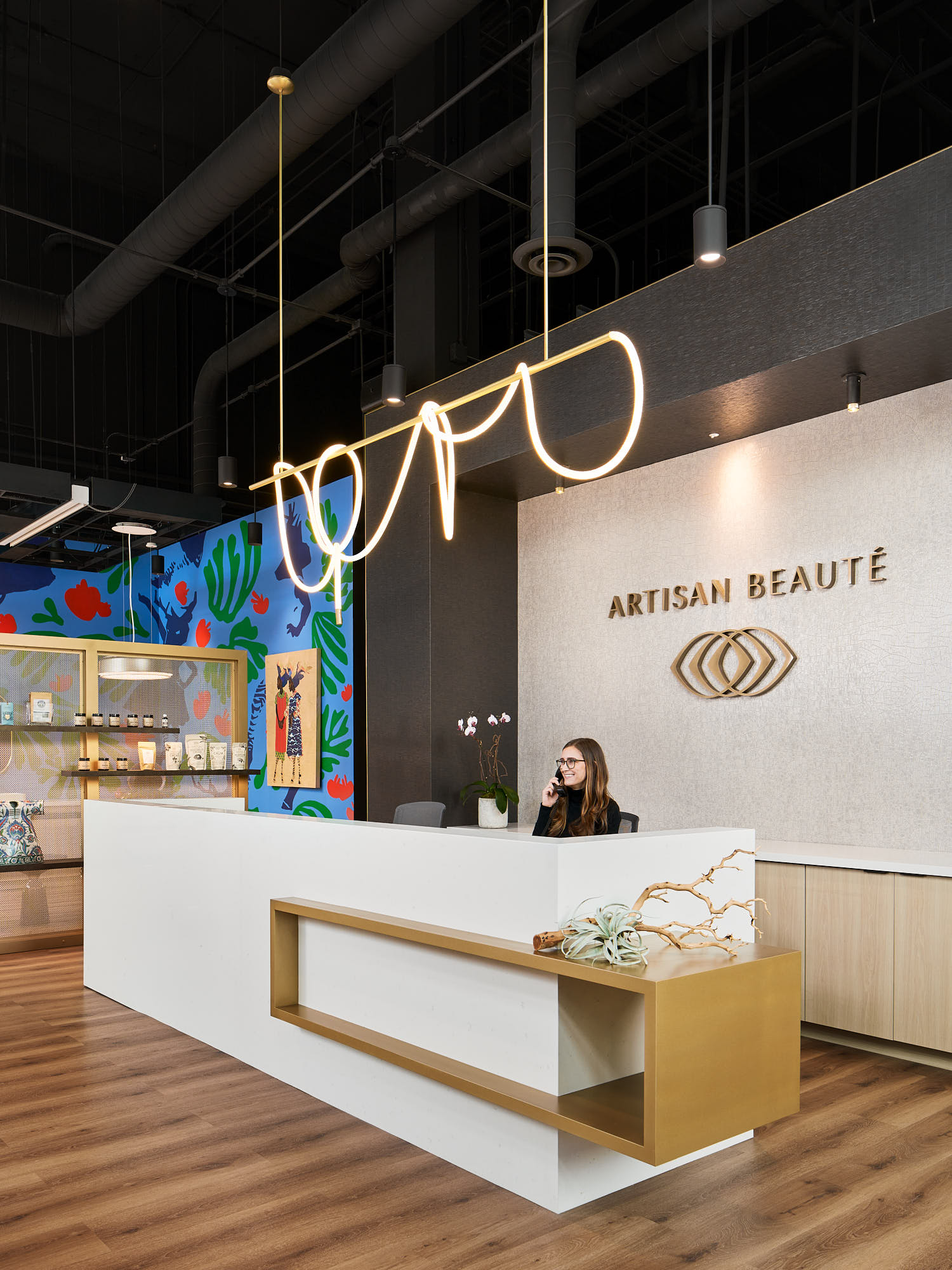 Browse a curated wall of SkinCeuticals, BR, and more while you check in at reception.