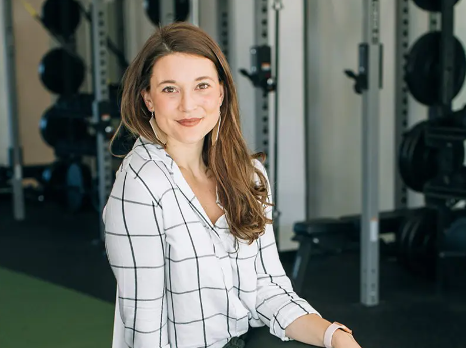 Headshot of founder Dr. Kristin Oja inside STAT Wellness Atlanta integrative health studio.