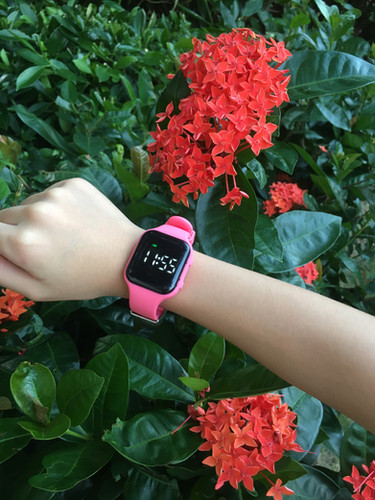 Montre vibrante rose