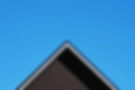 Roof Against Clear Blue Sky