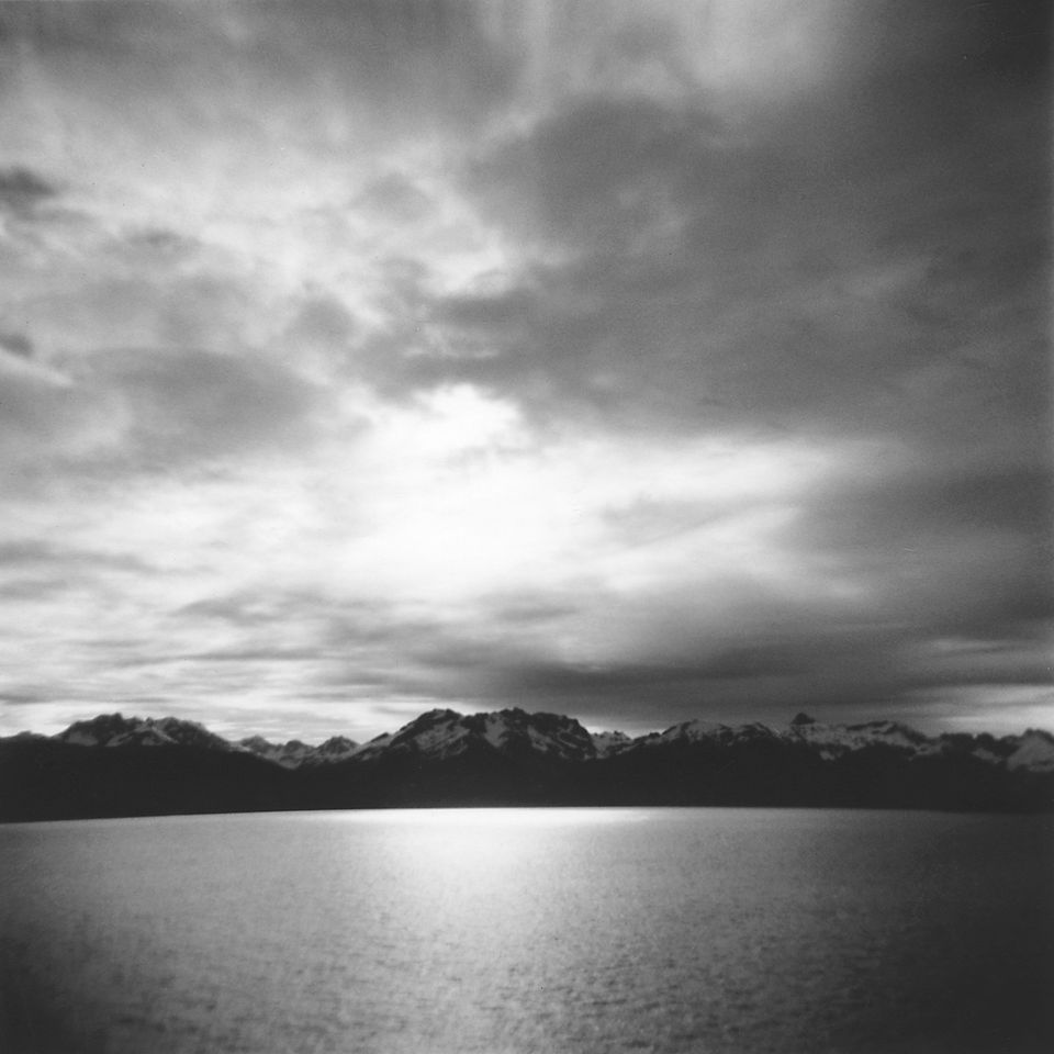 Sun shining through the clouds in Alaska