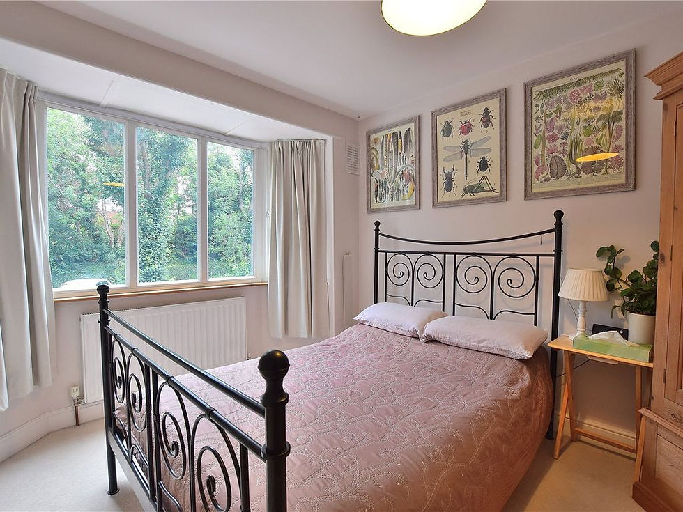 Soft light airy guest bedroom