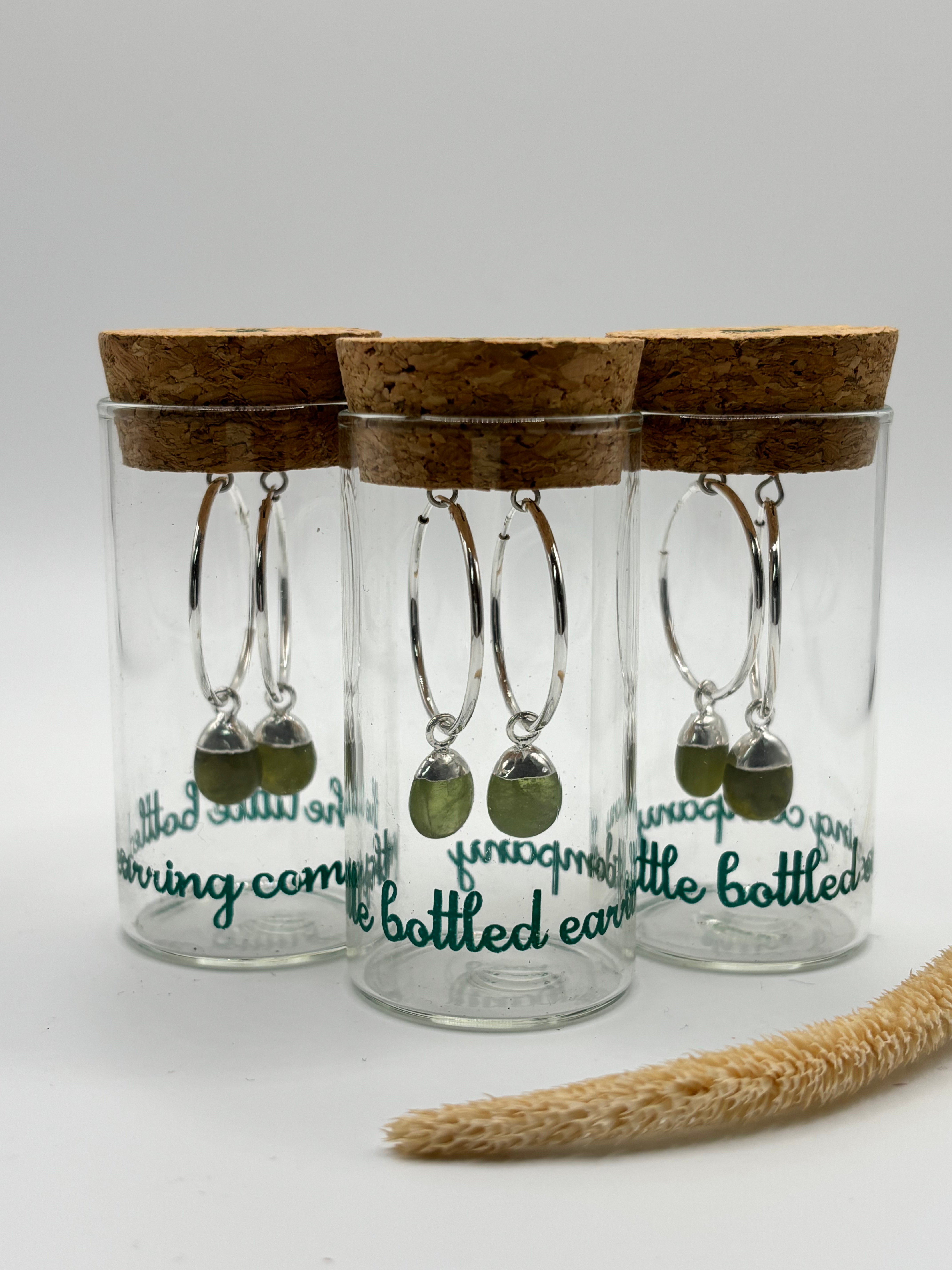 Sterling silver peridot hoop earrings