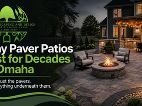 Paver patio installation in Omaha with outdoor fire pit, backyard seating, and Divine Landscape & Design logo