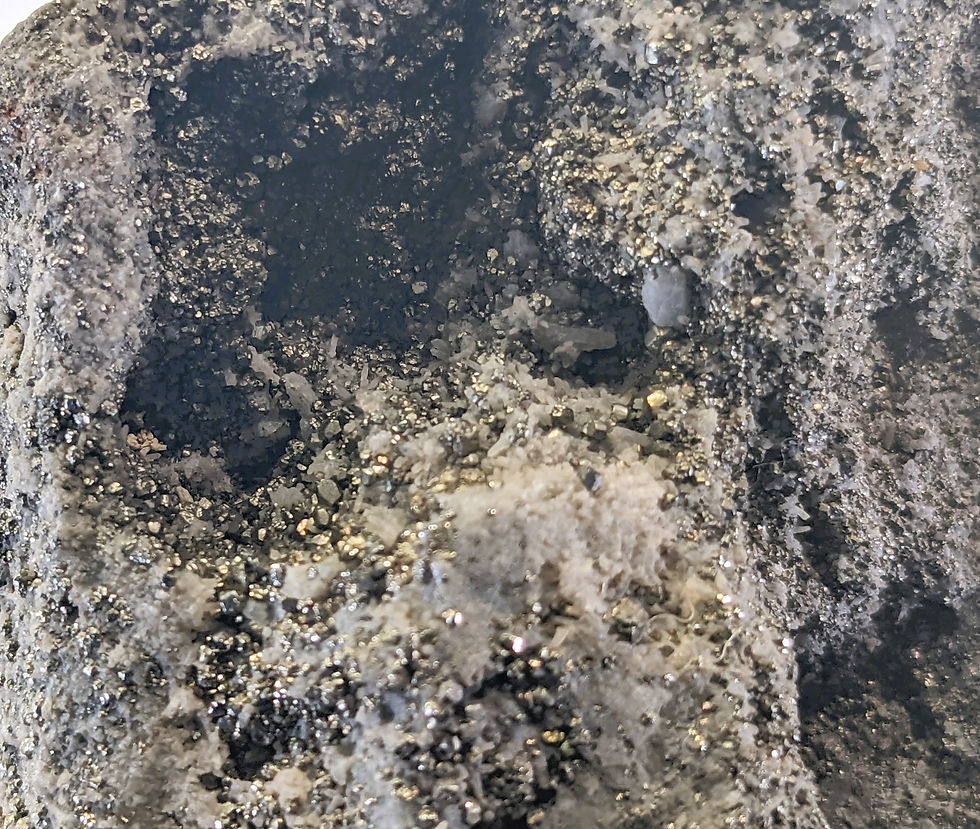 Natural Marcasite specimen with golden-silver sheen and raw texture