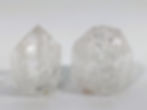 Natural crackle quartz flame with intricate internal fractures and shimmering clarity
