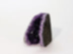 Amethyst crystal cluster with rich purple tones, known for calming energy and spiritual clarity. At jujujems.
