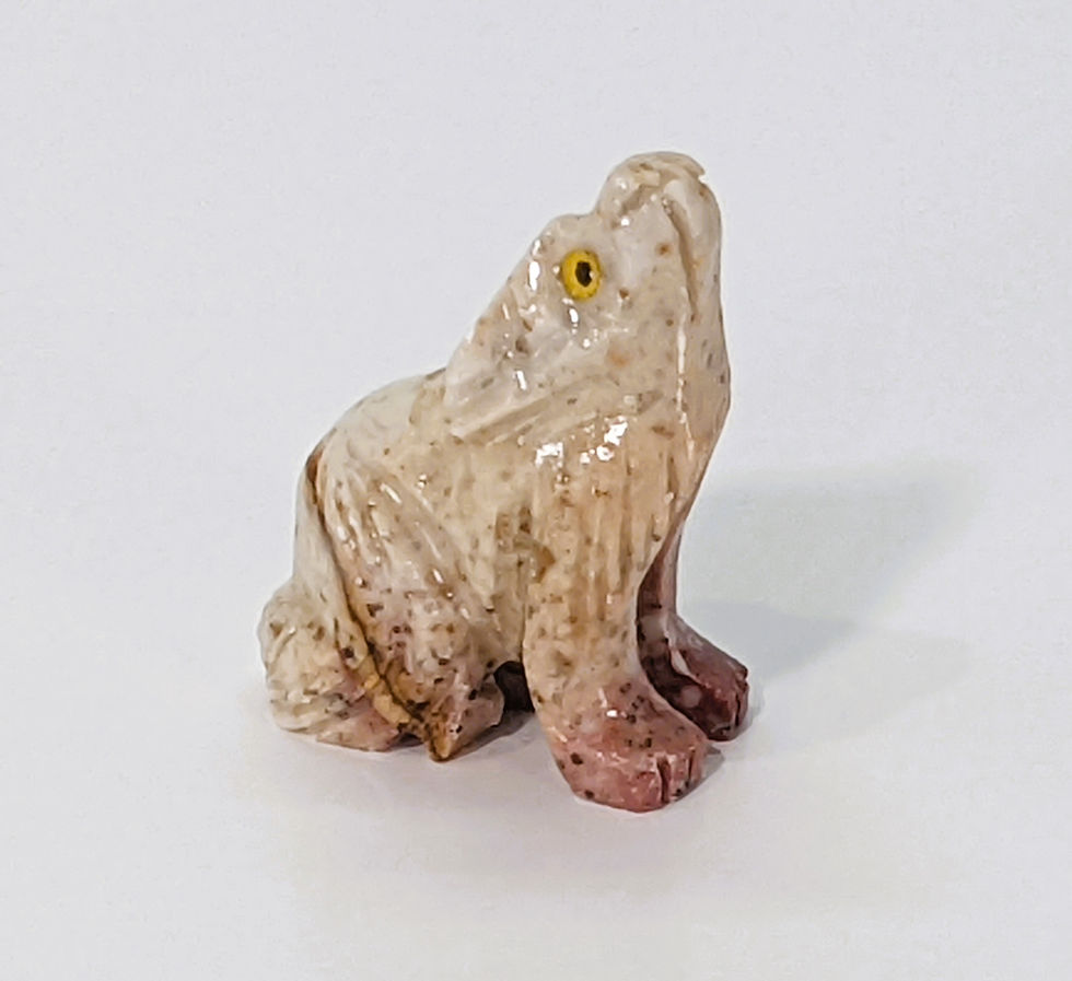 Thumbnail: Soapstone coyote carving, small and portable, representing adaptability and playful spirit.