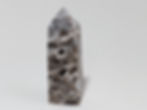 Carved Sphalerite Tower with polished geometric design.