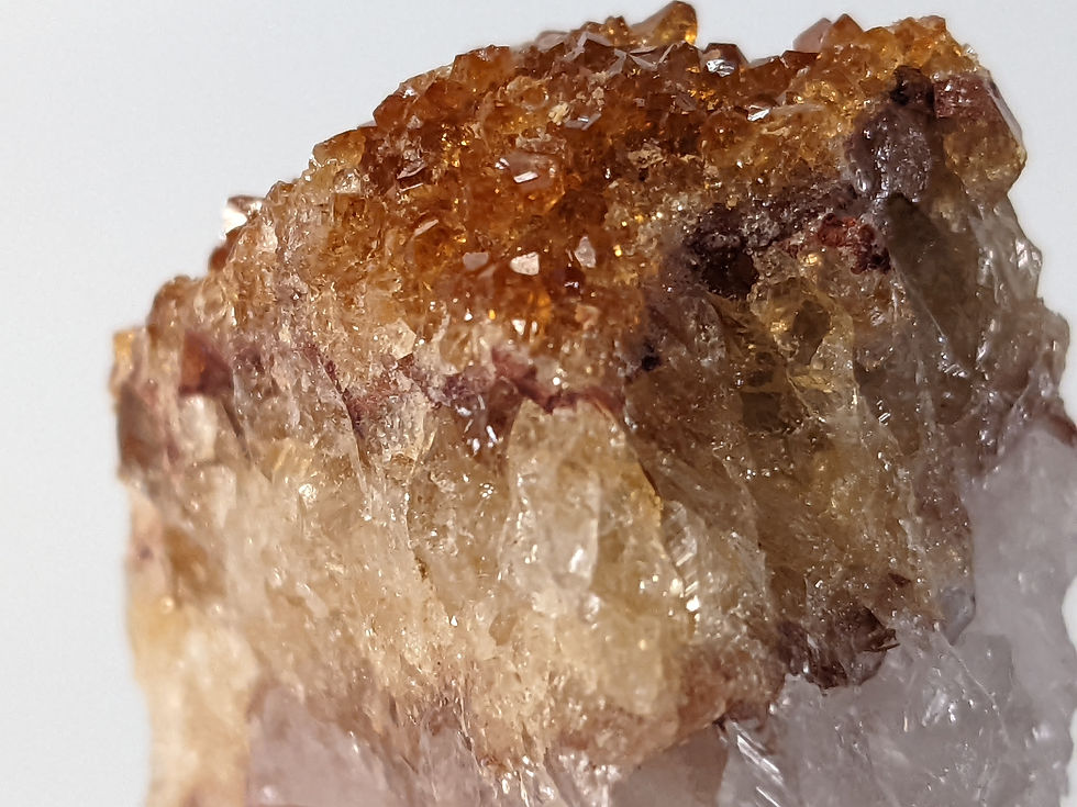 Citrine cluster with layered dark golden crystal formations.